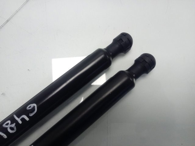 Amortecedor de tampa de porta-malas (de 3ª/5ª porta traseira) Peugeot/Citroen 9825534780