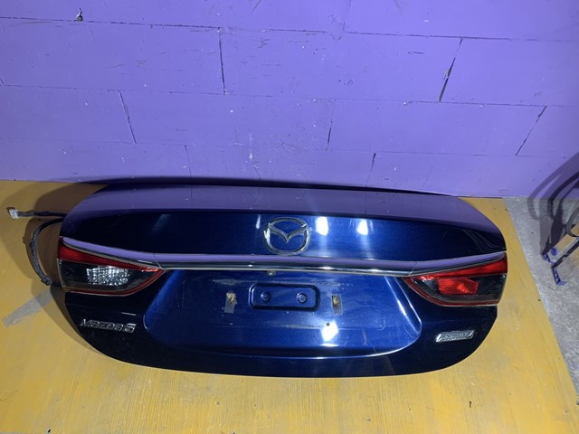 Compre GJY15261X Mazda Tampa de porta-malas
