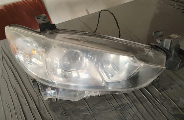 Compre GJS151041D Mazda Luz esquerda