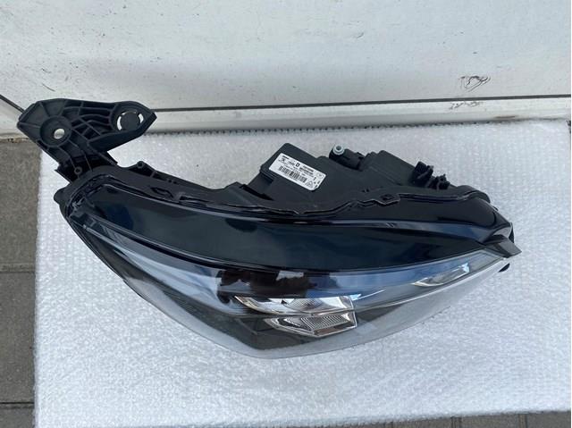 Luz direita Peugeot/Citroen 9833036180