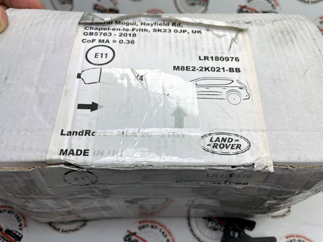 Sapatas do freio dianteiras de disco LR180976 Land Rover