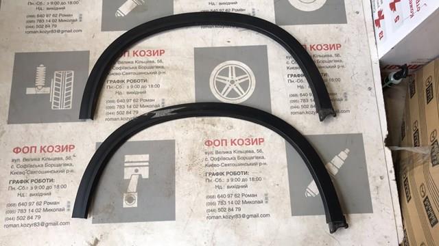 7725054P005PK Suzuki Expansor direito (placa sobreposta) de arco do pára-lama traseiro
