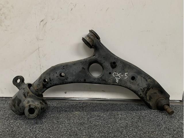 Compre KB7W34300H Mazda Braço oscilante inferior direito de suspensão dianteira