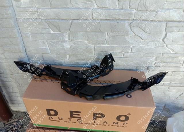Consola (adaptador) de fixação da luz dianteira esquerda FP7415241 FPS