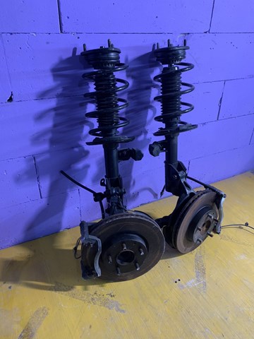 DD1V34700B Mazda Amortecedor dianteiro direito