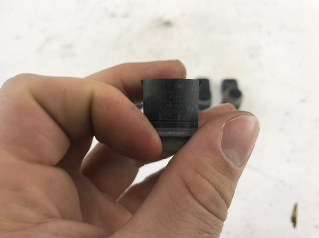 284384CL0A Nissan/Infiniti Sensor traseiro de sinalização de estacionamento (sensor de estacionamento)