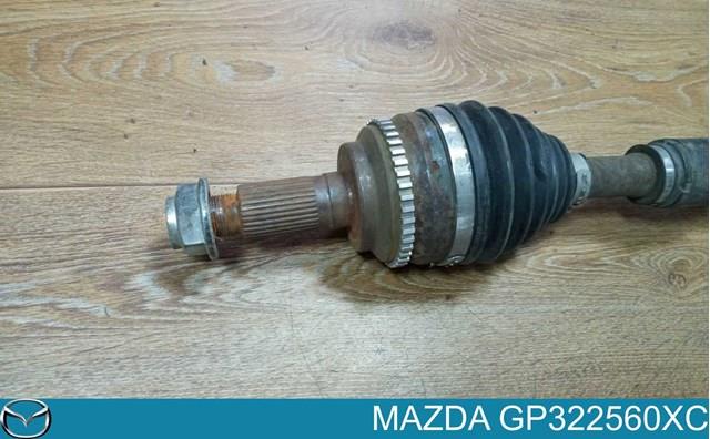 Semieixo (acionador) dianteiro esquerdo GP322560XB Mazda
