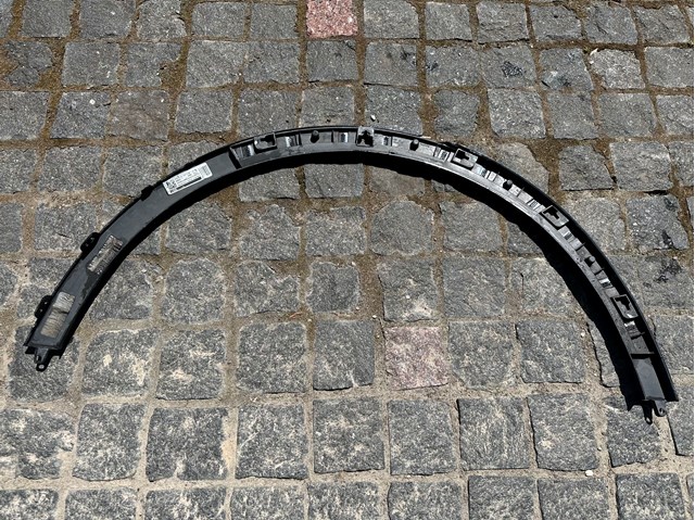 51779478315 BMW Expansor esquerdo (placa sobreposta) de arco do pára-lama traseiro