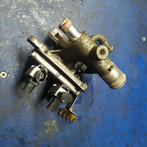 Compre 1S7G8K556AJ Ford Flange do sistema de esfriamento (união em T)
