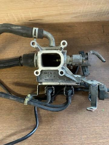 1S7G8K556AJ Ford Flange do sistema de esfriamento (união em T)