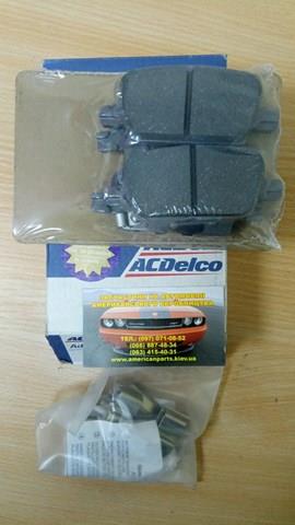 Compre 23498304 General Motors Sapatas do freio traseiras de disco