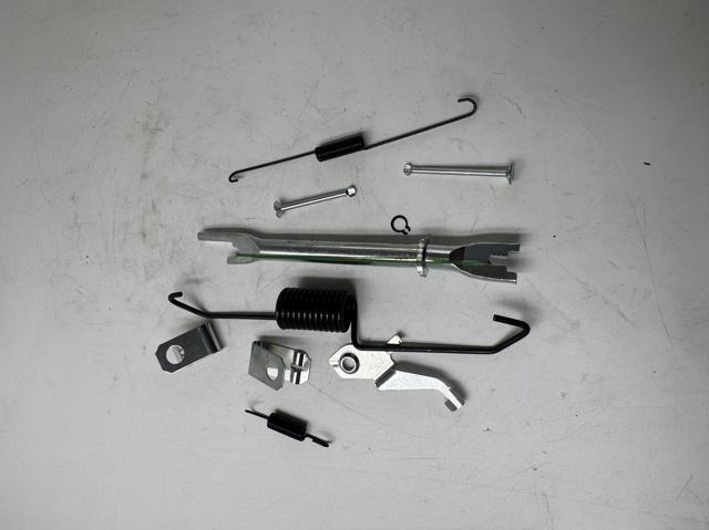 Q0940583 Q-fix Mecanismo de aproximação (de auto-aproximação) das sapatas de tambor (kit de reparação levadiça)