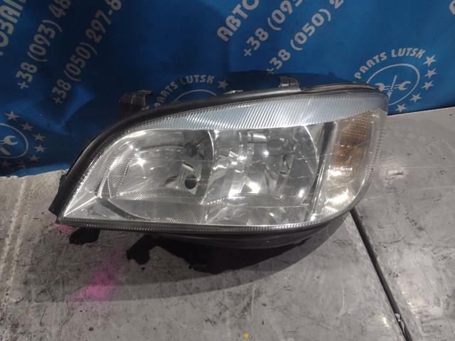 Luz esquerda 90582021 Opel