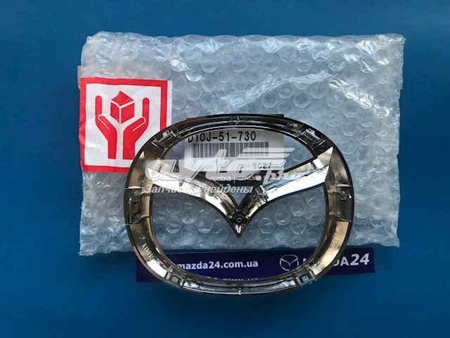D10J51730 Mazda Emblema de grelha do radiador
