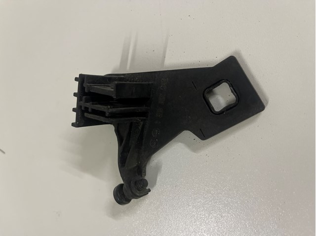 Consola (adaptador) de fixação da luz dianteira esquerda 1301330049 VAG