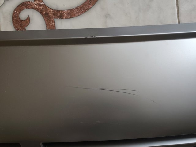 86670GI000YEV Hyundai/Kia Placa sobreposta do pára-choque traseiro