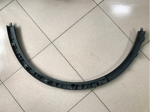 Expansor esquerdo (placa sobreposta) de arco do pára-lama traseiro 51779478315 BMW