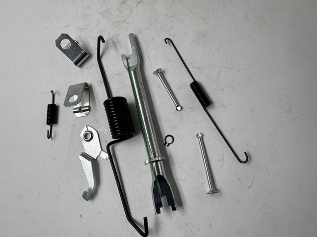 Mecanismo de aproximação (de auto-aproximação) das sapatas de tambor (kit de reparação levadiça) Q-fix Q0940583 preço, a partir de 45,60 USD