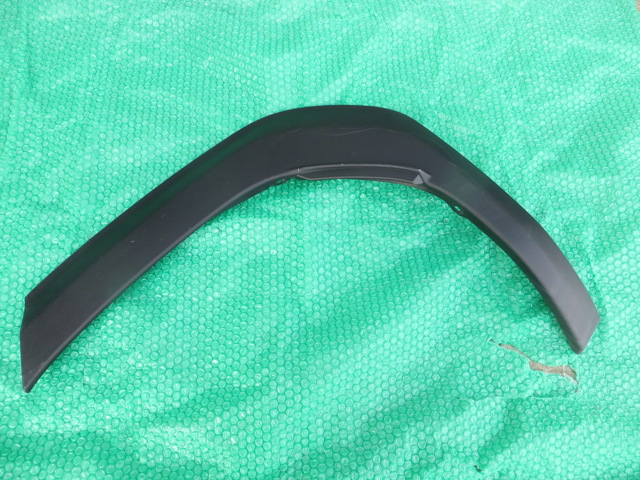 Expansor esquerdo (placa sobreposta) de arco do pára-lama traseiro 75606K2011 Toyota