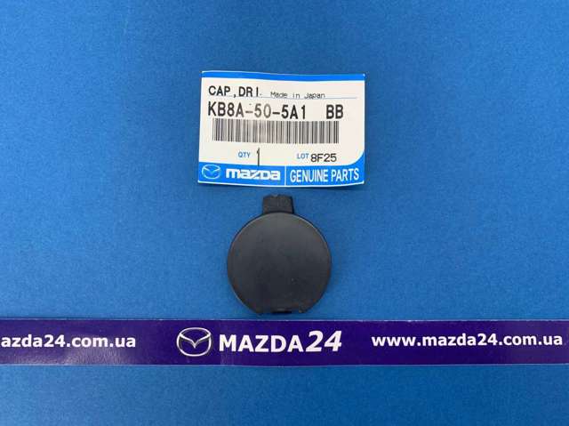 Tampão direito do pára-choque traseiro KB8A505A1BB Mazda