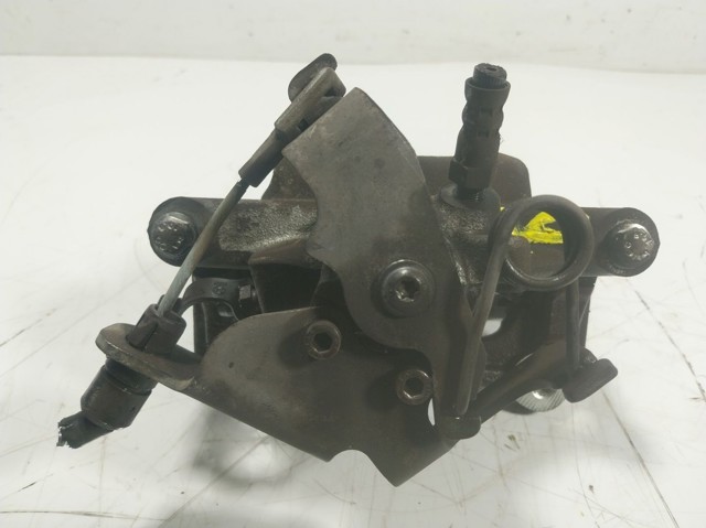 1843320 Ford Suporte do freio traseiro direito