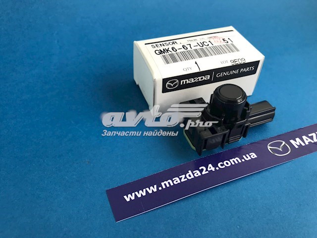 GMK667UC151 Mazda Sensor traseiro de sinalização de estacionamento (sensor de estacionamento)
