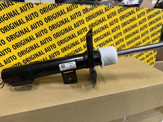 Amortecedor dianteiro direito DFR534700 Mazda