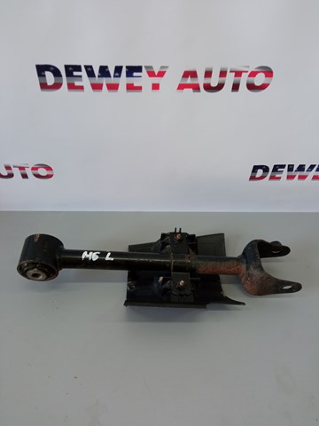 Braço oscilante transversal esquerdo de suspensão traseira Mazda KB7W28550 preço, a partir de 51,41 USD