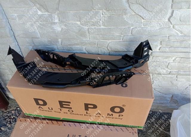FP7415241 FPS Consola (adaptador) de fixação da luz dianteira esquerda