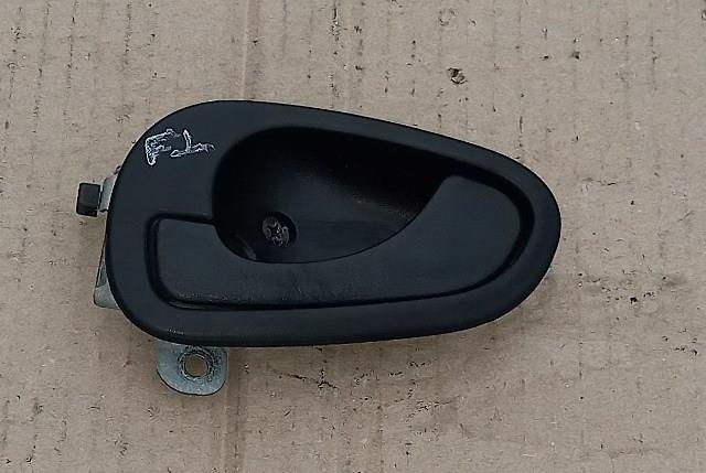 Maçaneta interna dianteira/traseira da porta esquerda Mitsubishi MR911087