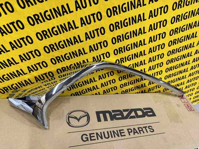 D10J507K0C Mazda Moldura esquerda do pára-choque dianteiro